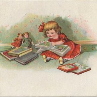 Meisje leest voor aan de poppen